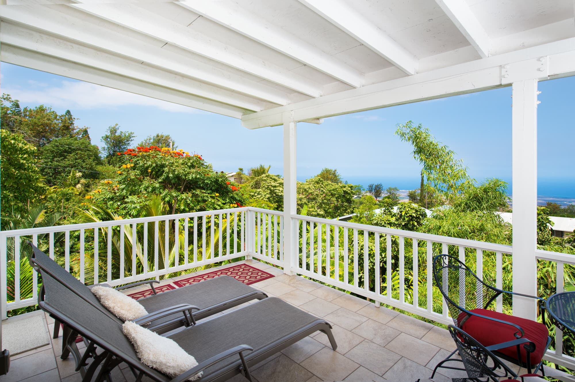 Covered lanai with ocean view at Bears' Place